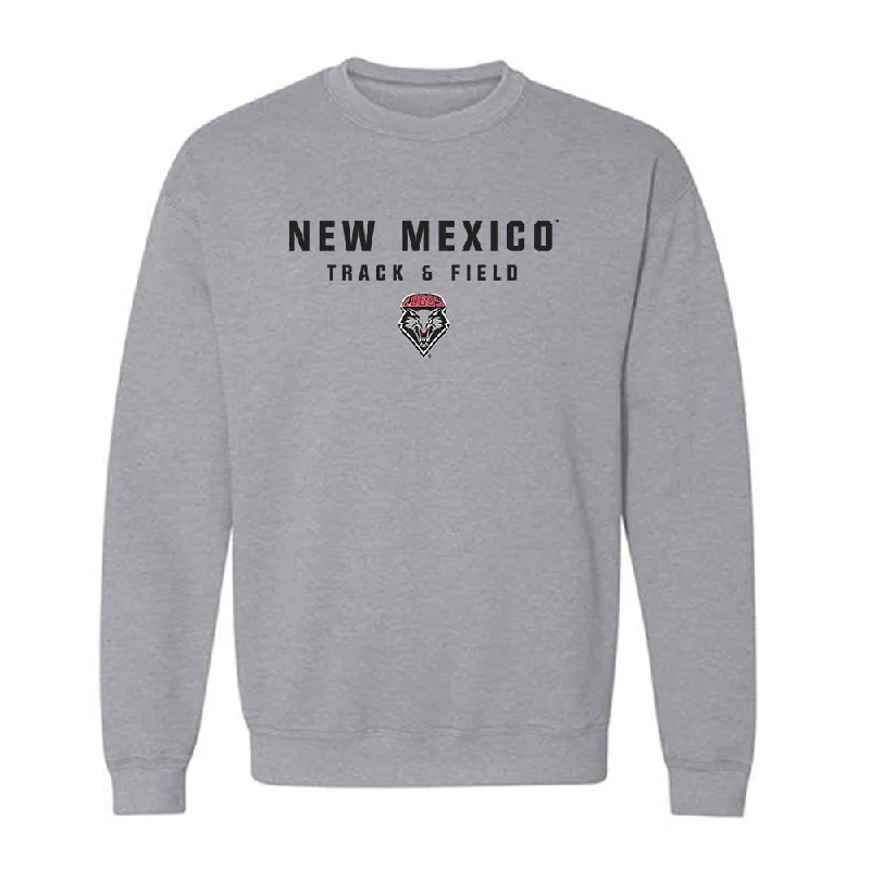 New Mexico - NCAA Women's Track & Field : Rebecca Grieve - Classic Shersey Crewneck Sweatshirt Hoodie with Side Slits Relaxed Casual New Mexico - NCAA Women's Track & Field : Rebecca Grieve - Classic Shersey Crewneck Sweatshirt Hoodie with Side Slits Relaxed Casual